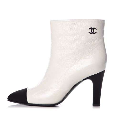 Chanel white boots black toe